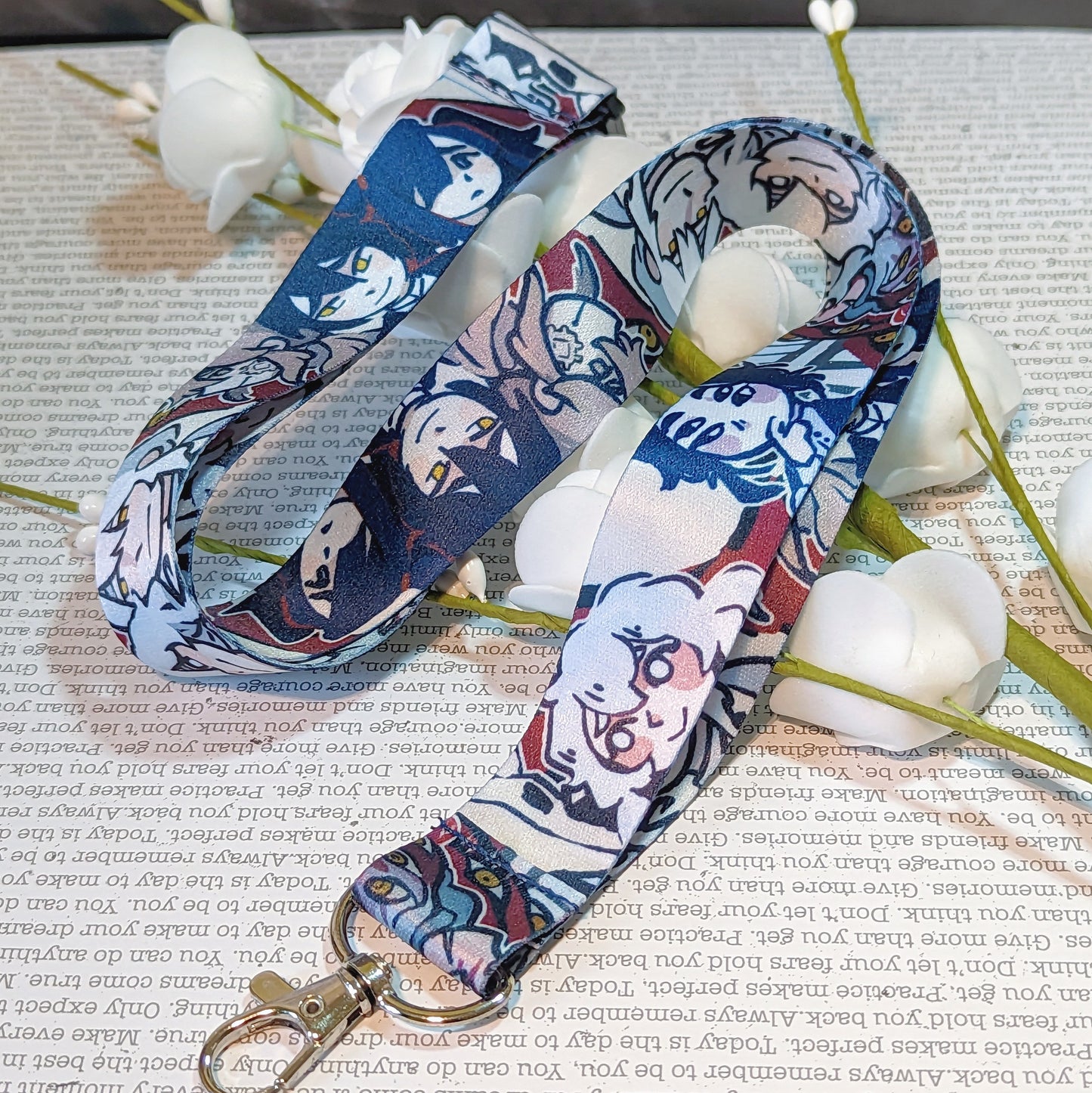 Lanyard of different characters from the different Hello Charlotte games.
