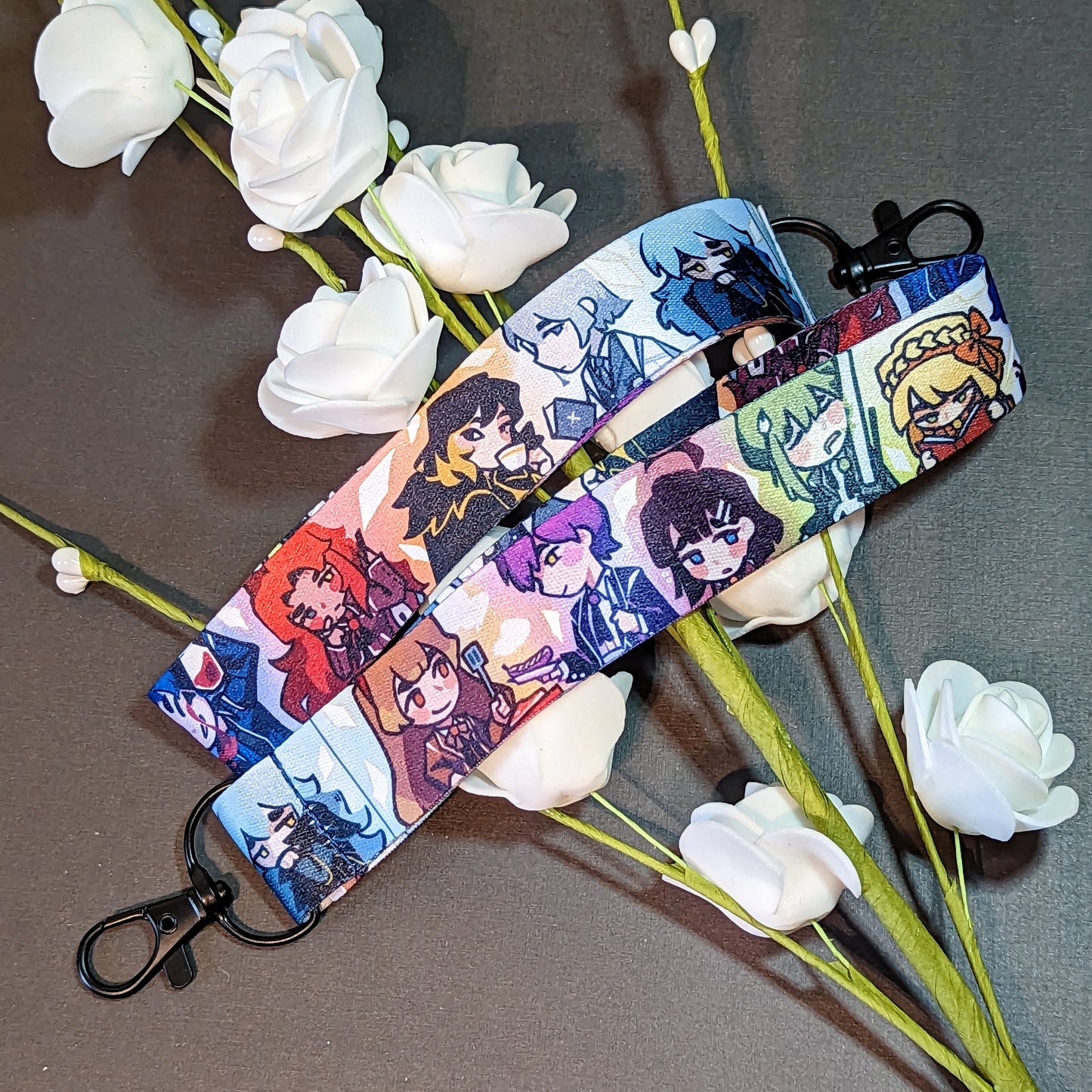 Two wrist lanyards of the various patron librarians from Library of Ruina.
